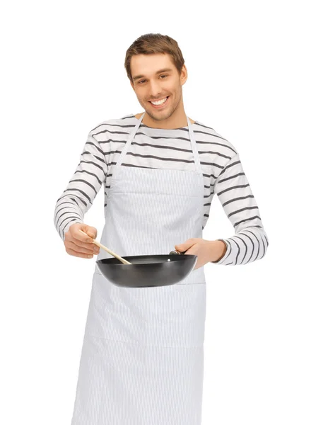 Handsome man with pan and spoon — Stock Photo, Image