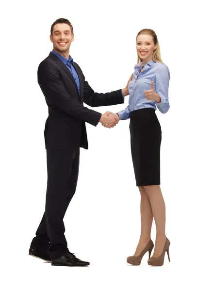 Man and woman shaking their hands — Stock Photo, Image