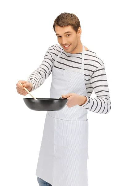 Όμορφος άντρας με τηγάνι και κουτάλι — Φωτογραφία Αρχείου