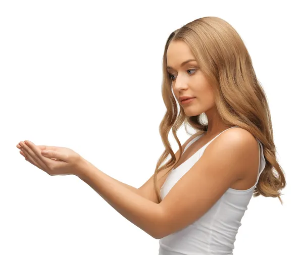 Woman holding something on the palms Stock Photo by ©Syda_Productions