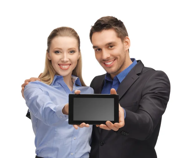 Muž a žena s tabletou ks — Stock fotografie