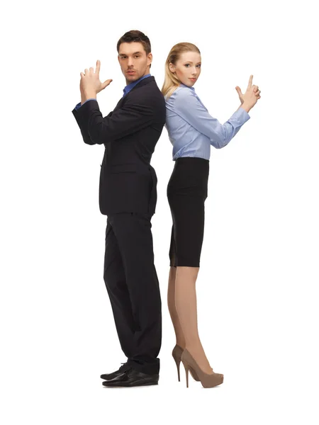 Man and woman making a gun gesture — Stock Photo, Image