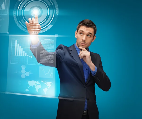 Man in suit working with virtual screens — Stock Photo, Image