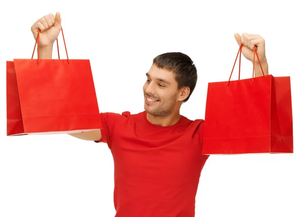 Mężczyzna z torbami na zakupy — Zdjęcie stockowe
