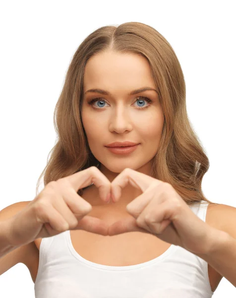 Kobieta tworzących kształt serca — Zdjęcie stockowe