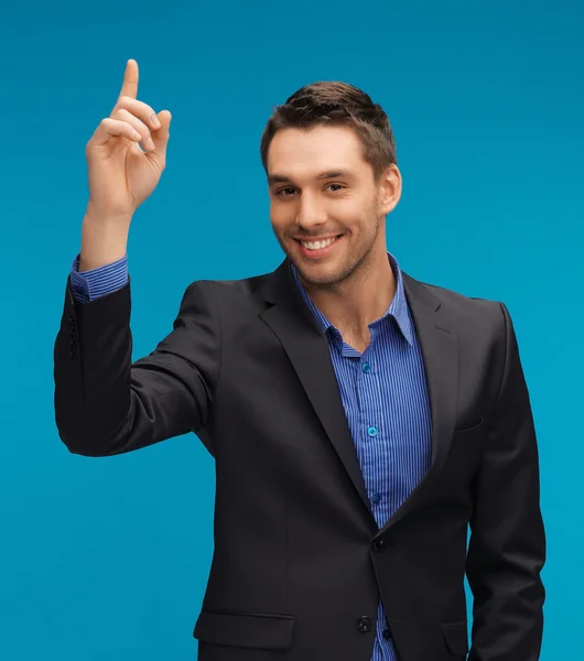 Man in suit with his finger up — Stock Photo, Image