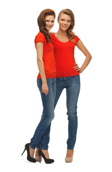 Two beautiful teenage girls in red t-shirts — Stock Photo, Image