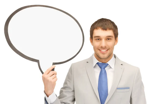 Businessman with blank text bubble — Stock Photo, Image