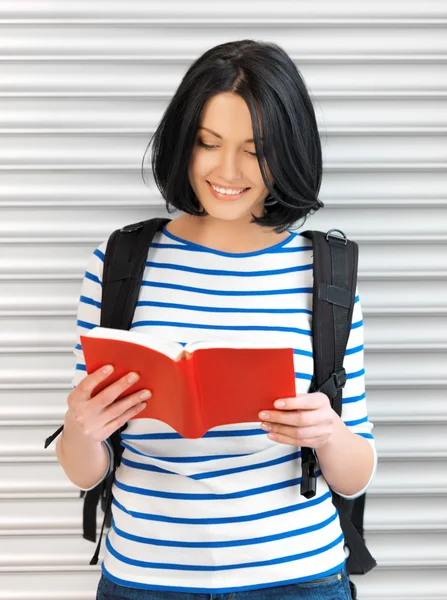 Donna con borsa e libro — Foto Stock