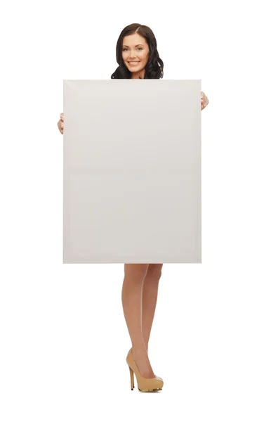 Lovely woman in blue dress with blank board — Stock Photo, Image