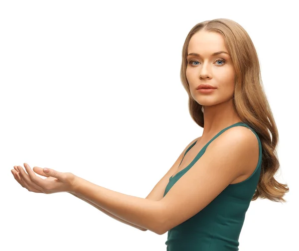 Woman holding something on the palms — Stock Photo, Image