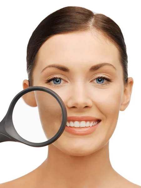 Woman with magnifying glass Stock Photo