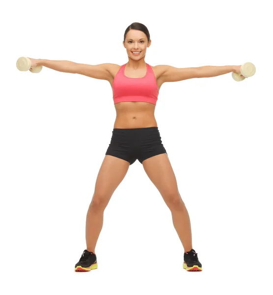 Woman with dumbbells — Stock Photo, Image