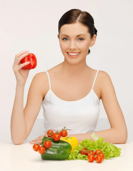 Woman with vegetables Royalty Free Stock Images