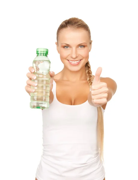 Jong mooi vrouw met fles water — Stockfoto