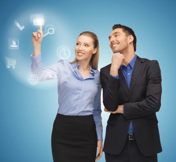 Man and woman working with virtual screen — Stock Photo, Image