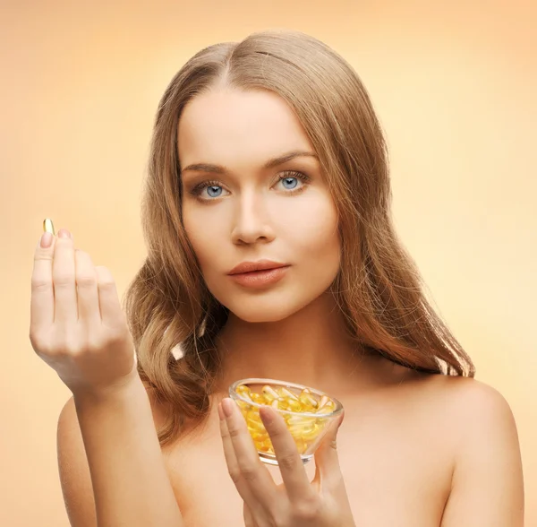 Mulher com vitaminas — Fotografia de Stock