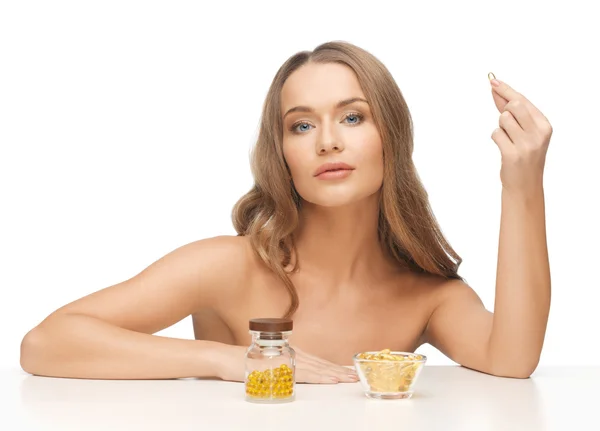 Mujer con vitaminas — Foto de Stock