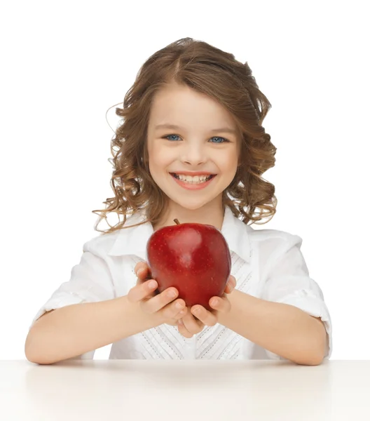 Mädchen mit rotem Apfel — Stockfoto