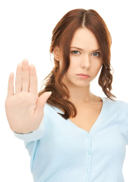 Woman making stop gesture Stock Photo