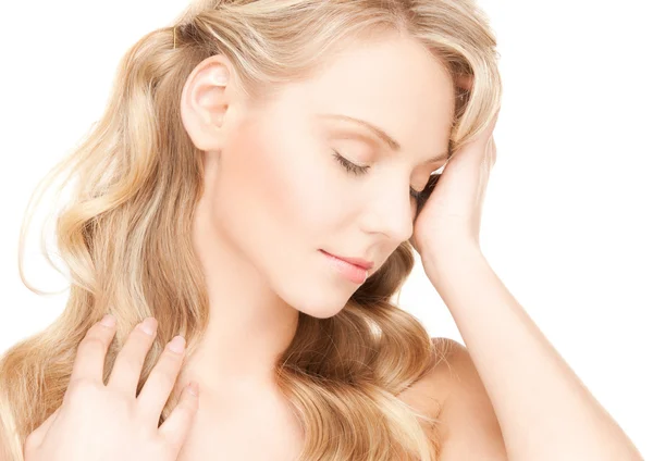 Worried woman with long hair — Stock Photo, Image