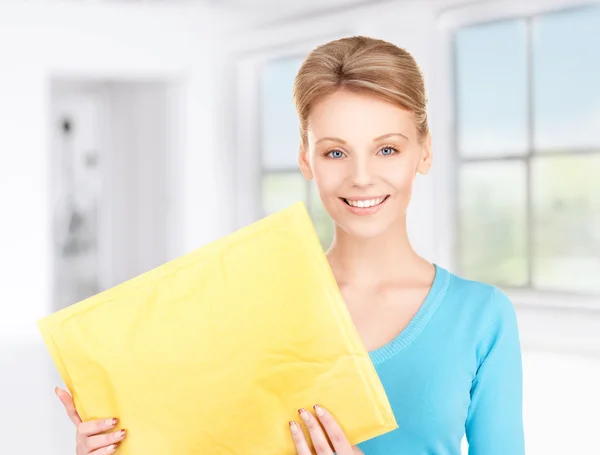 Businesswoman with parcel — Stock Photo, Image