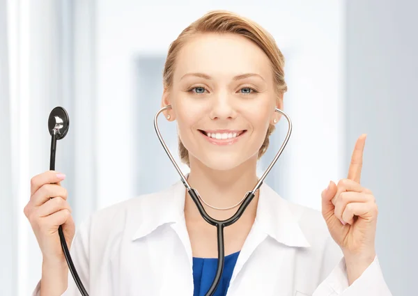 Attractive female doctor with stethoscope — Stock Photo, Image