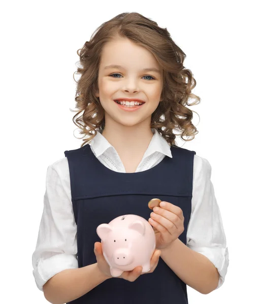 Girl with piggy bank — Stock Photo, Image