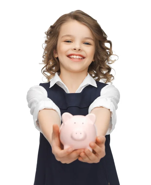 Girl with piggy bank — Stock Photo, Image