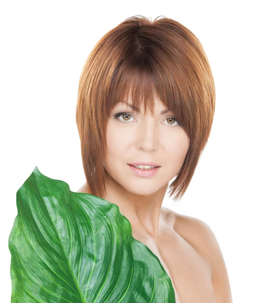 Woman with green leaf — Stock Photo, Image