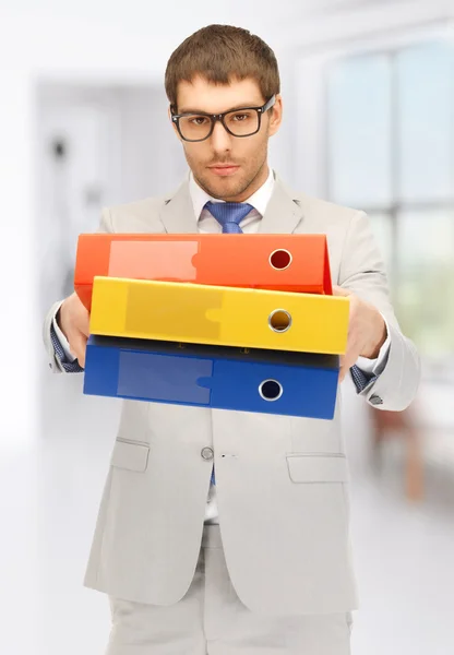 Man with folders — Stock Photo, Image