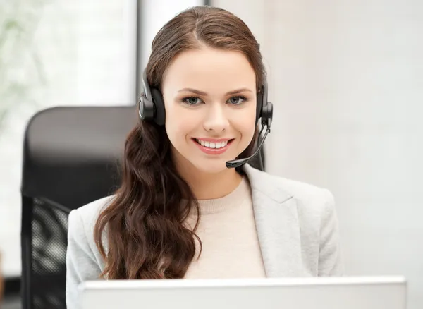 Friendly female helpline operator — Stock Photo, Image