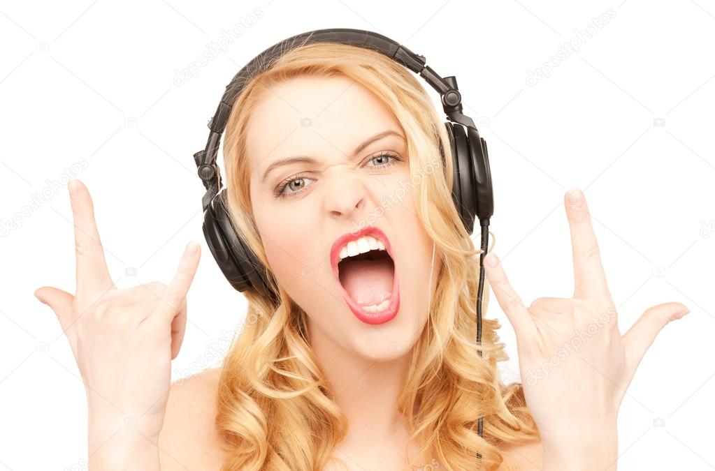 depositphotos_21978353-stock-photo-woman-with-headphones-showing-rock.jpg