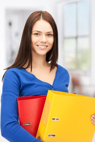 Mujer con carpetas — Foto de Stock