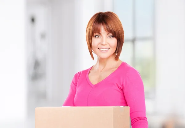 Businesswoman with parcel — Stock Photo, Image