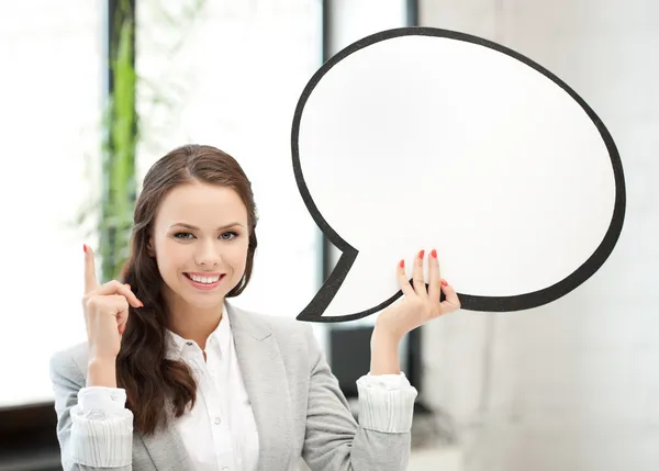 Smiling businesswoman with blank text bubble — Stock Photo, Image