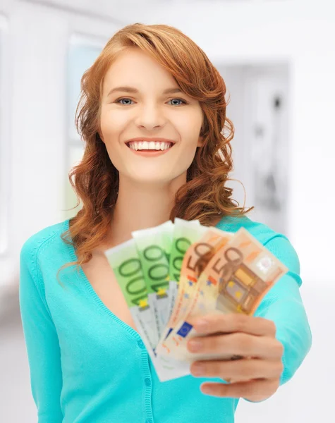 Happy teenage girl with euro cash money — Stock Photo, Image