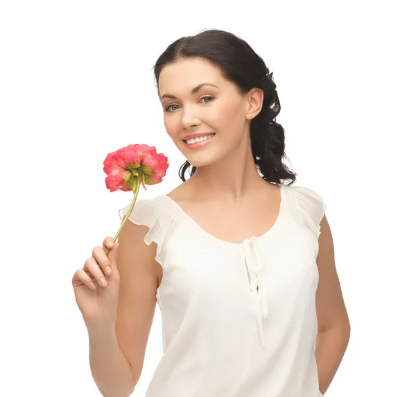 Jonge en mooie vrouw met bloem — Stockfoto