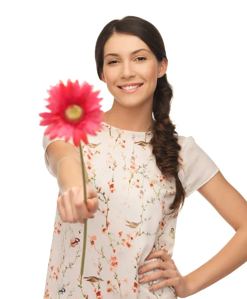 Mulher jovem e bonita com flor — Fotografia de Stock