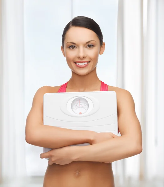 Woman with scale — Stock Photo, Image