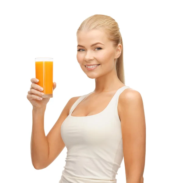 Mujer sosteniendo vaso de jugo de naranja —  Fotos de Stock