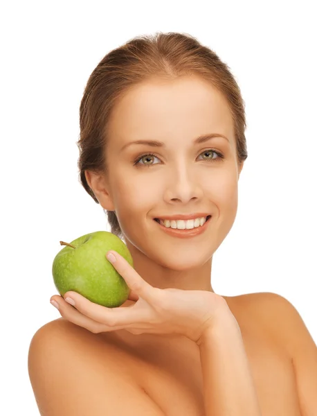 Mujer sonriente con una manzana — Foto de Stock