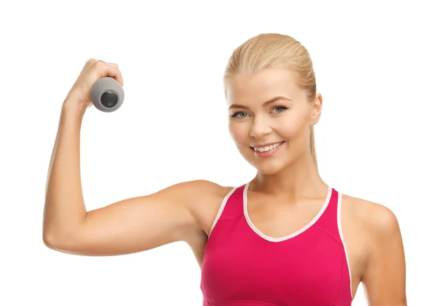 Joven mujer deportiva con mancuerna ligera — Foto de Stock