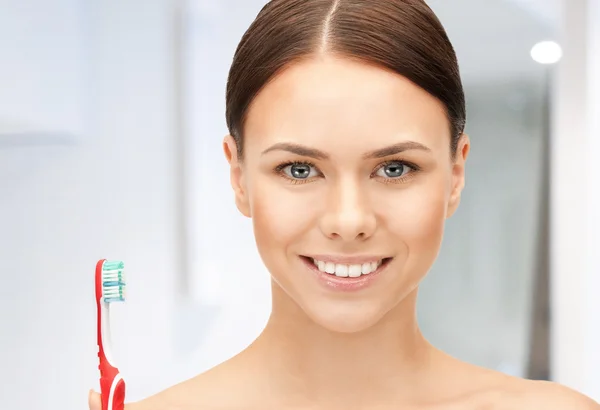 Beautiful woman with toothbrush — Stock Photo, Image