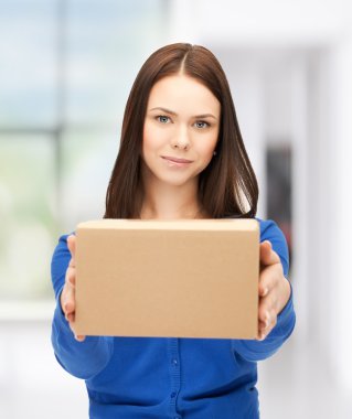 Businesswoman delivering box clipart
