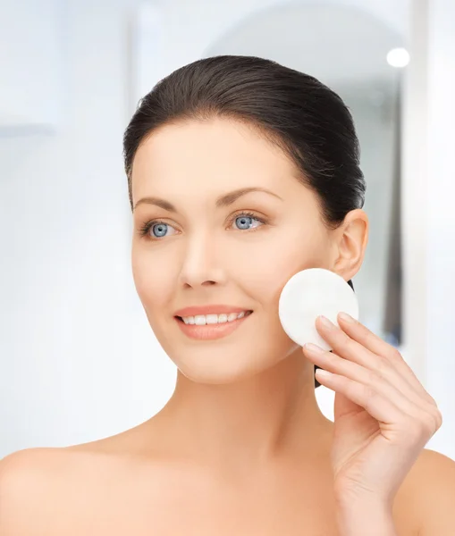 Beautiful woman with cotton pad — Stock Photo, Image