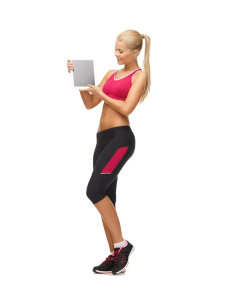 Mujer deportiva con tableta pc — Foto de Stock