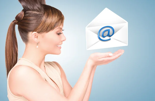 Woman showing virtual envelope — Stock Photo, Image