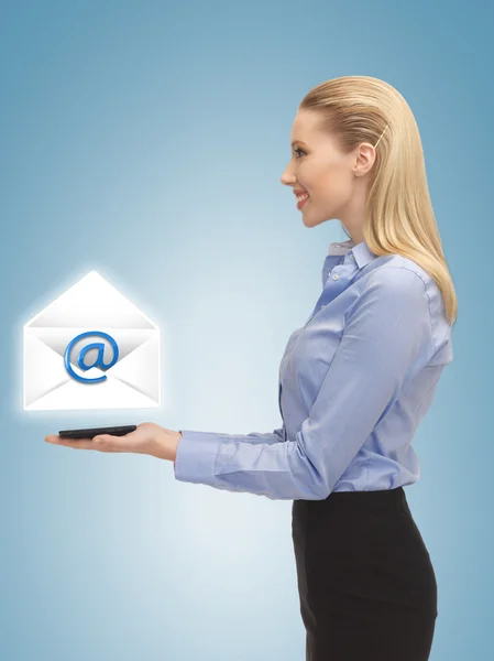 Woman showing virtual envelope — Stock Photo, Image