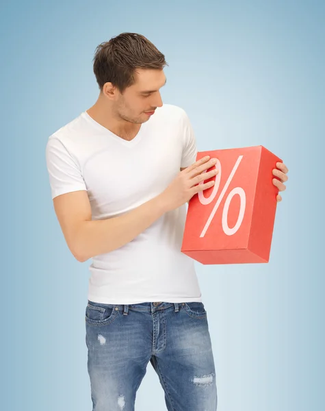 Man with big percent box — Stock Photo, Image